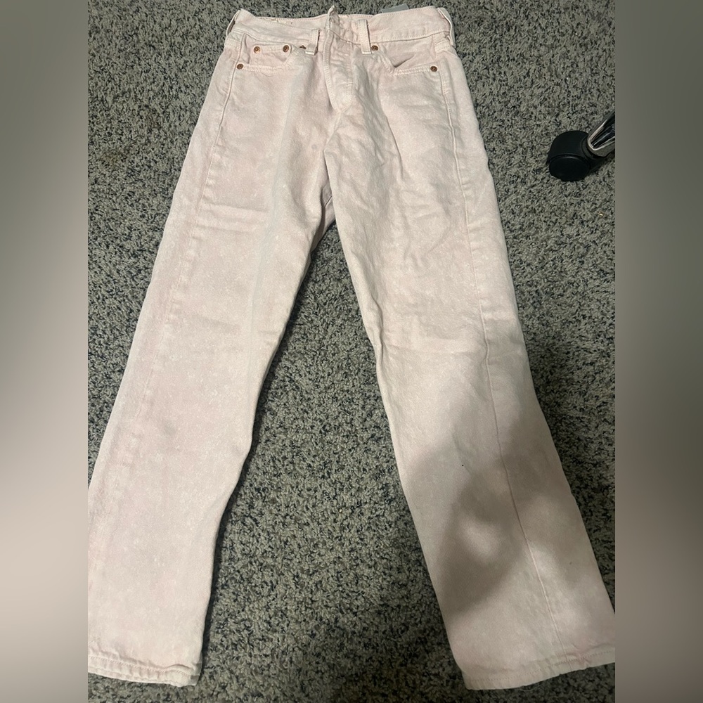 Baby pink Levi Jeans